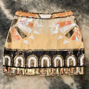 Boutique sequin mini skirt with tribal pattern